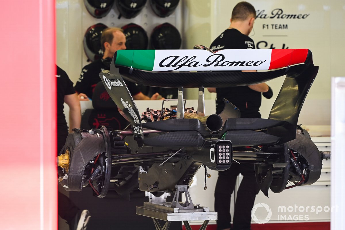 The rear wing and suspension of an Alfa Romeo C43 in the team's garage