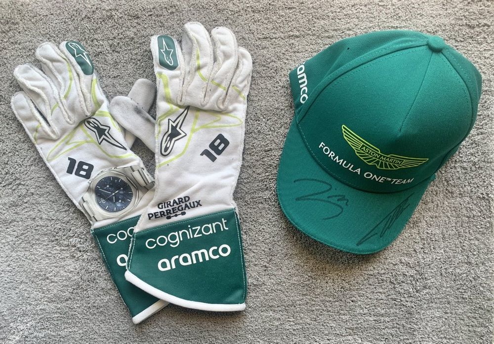 The gloves and cap signed by Stroll will be auctioned off after the rally to raise funds for charity