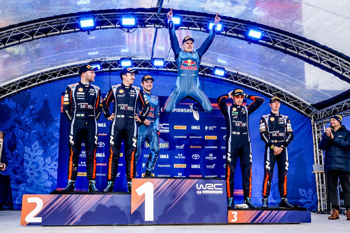 Ott Tänak celebrates victory with his customary podium leap