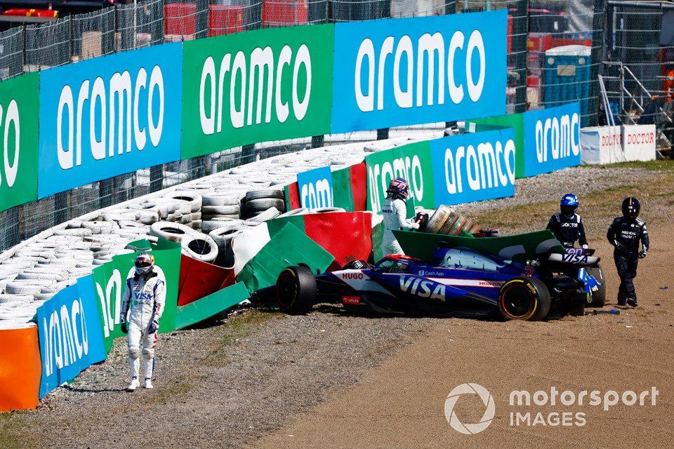 The cars of Daniel Ricciardo, RB F1 Team VCARB 01 and Alex Albon, Williams FW46 in the tyre barrier after they crashed on the opening lap